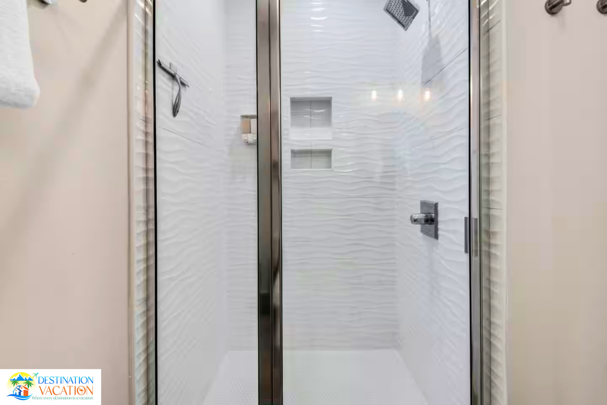 A crisp, modern shower welcomes refreshing mornings.
