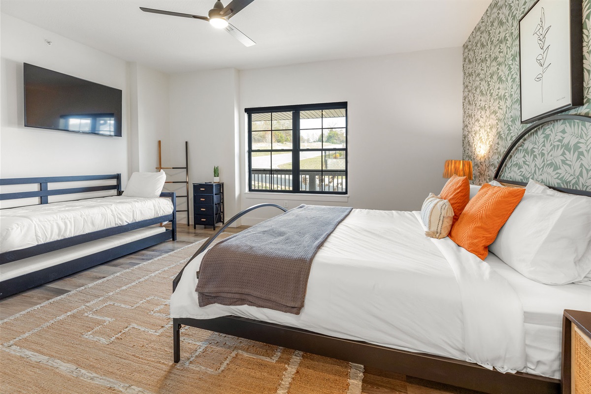 Main level King bedroom #2 w/ daybed and trundle, ensuite bath