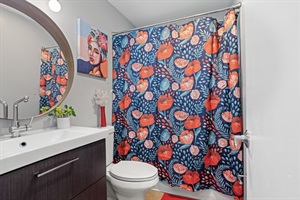 Step into our well-equipped full bathroom adorned with essential amenities, guaranteeing a refreshing escape after a day filled with adventures.