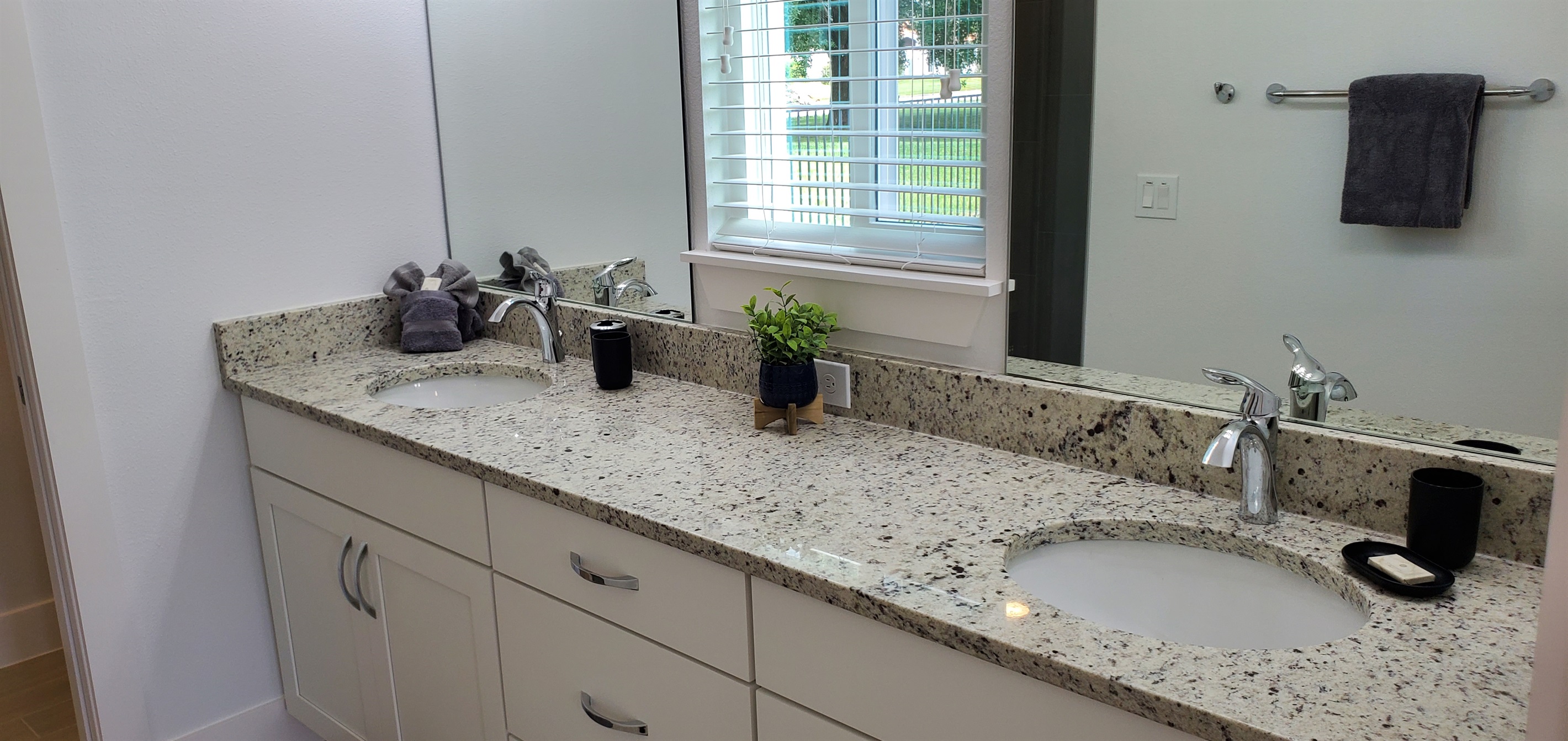 Master King bedroom ensuite - double sink, toilet and large walk-in shower.