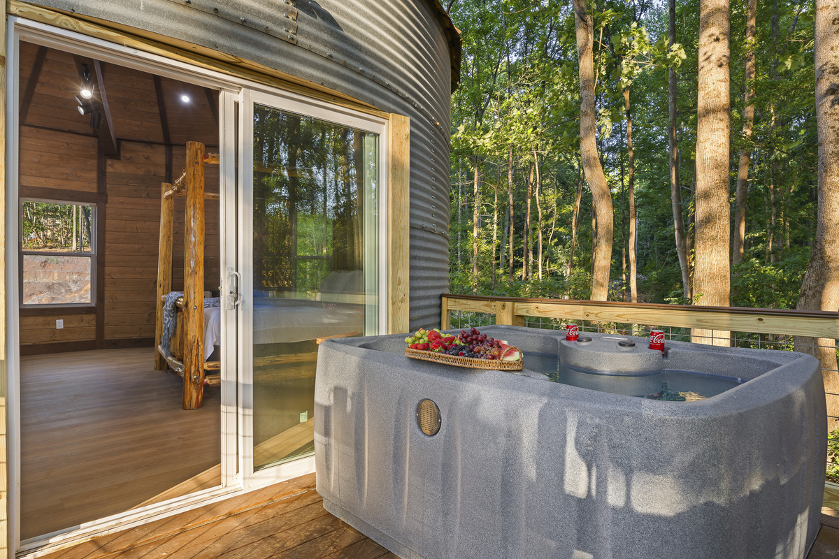 Hot Tub Oasis: Unwind in a private hot tub surrounded by serene forest views. Perfect for relaxation!