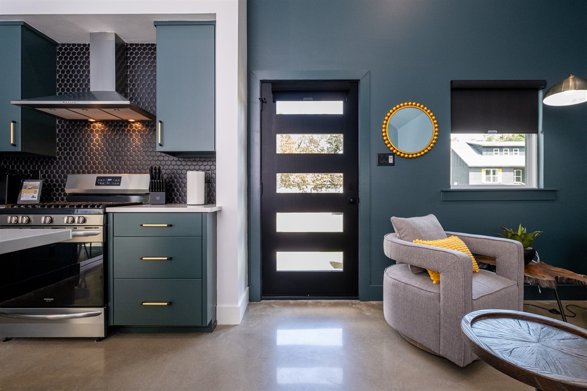 Easily Cook while your Guests Enjoy Lounging in the Living Room.