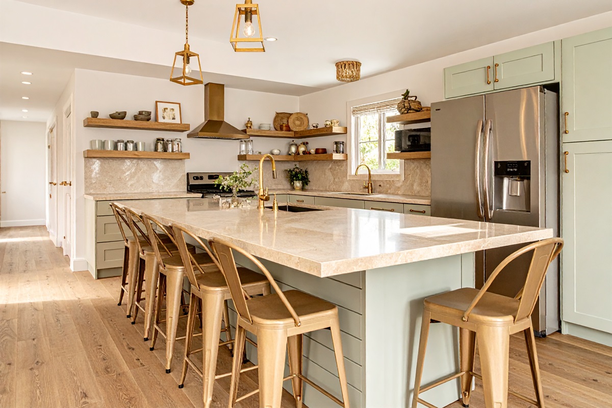 Kitchen includes Dishwasher, Oven, Stovetop, Microwave, Fridge | Representative Interior. Finishes and decor vary by Unit