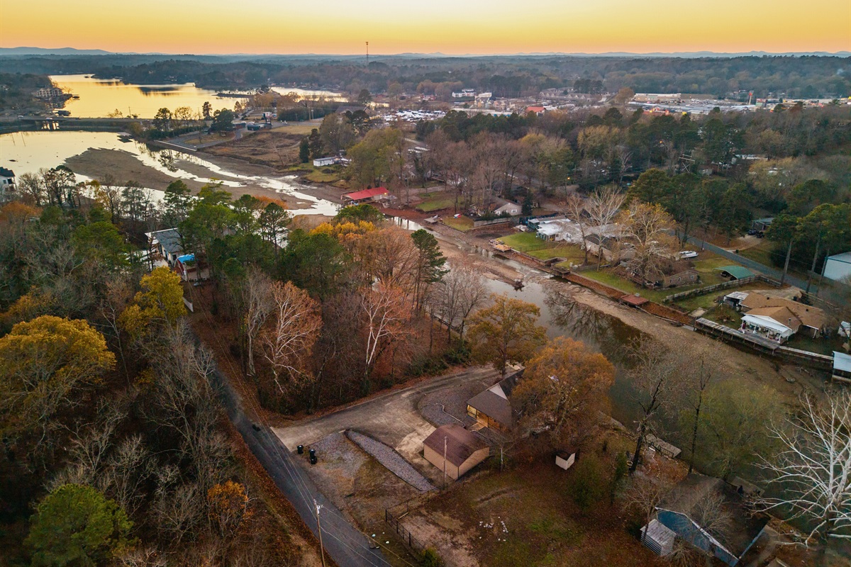 Another overhead look highlights the quiet charm of the neighborhood and the beautiful flow of the lake as it winds through the area.