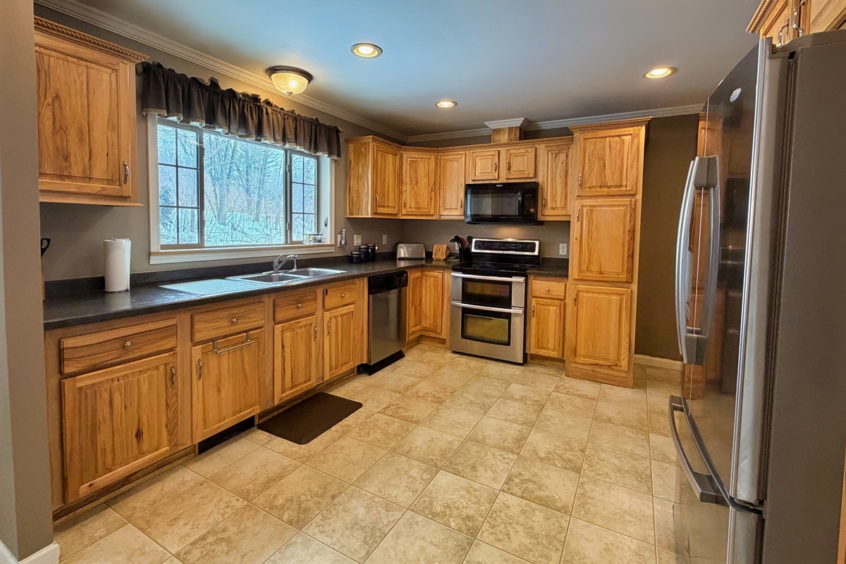 Kitchen with stainless steel appliances.