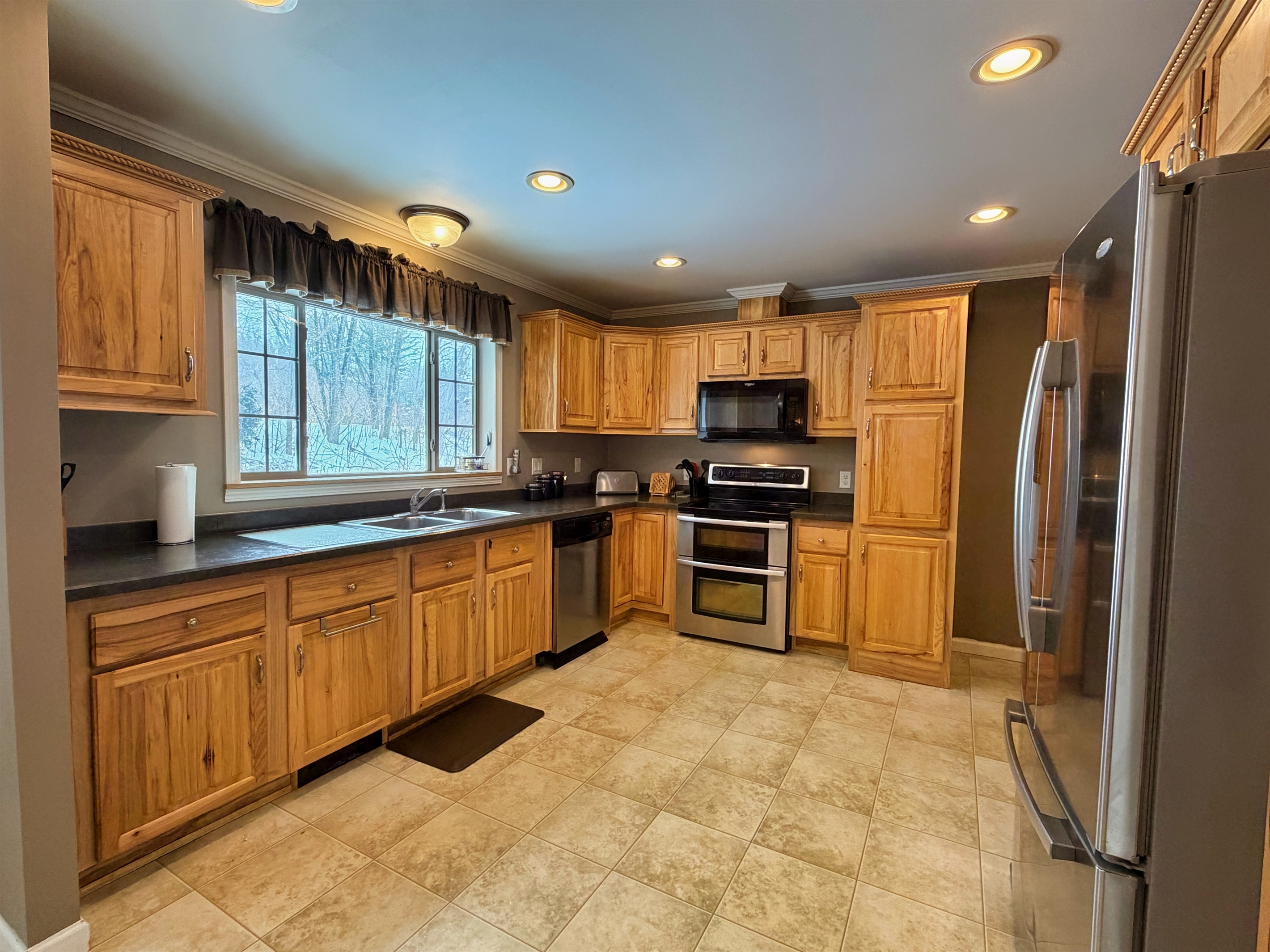Kitchen with stainless steel appliances.