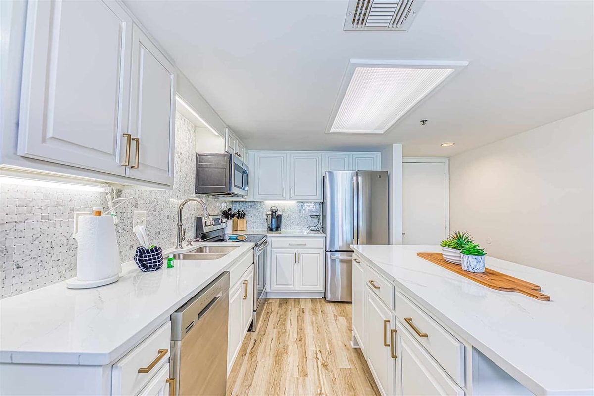 Kitchen: Sleek, modern design with spacious countertops for your culinary adventures!
