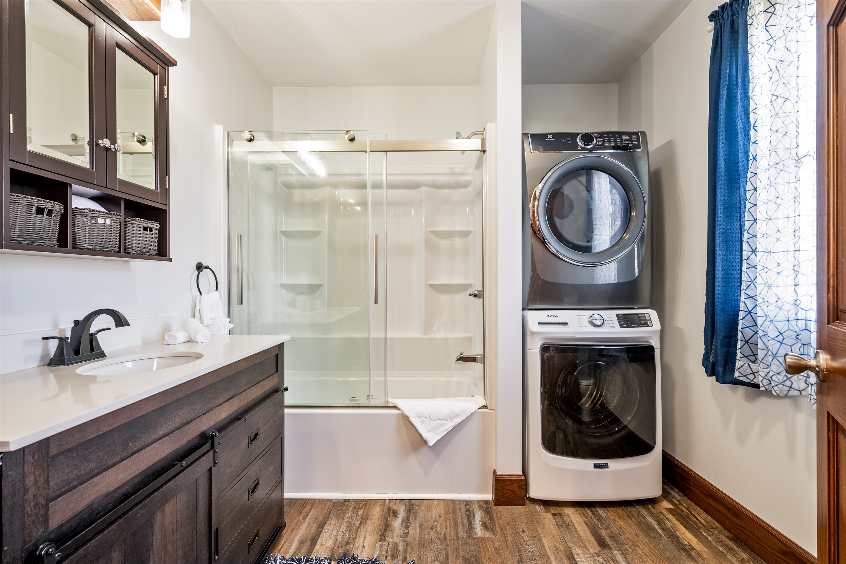 Laundry room and half bath combination—ideal for extended stays.