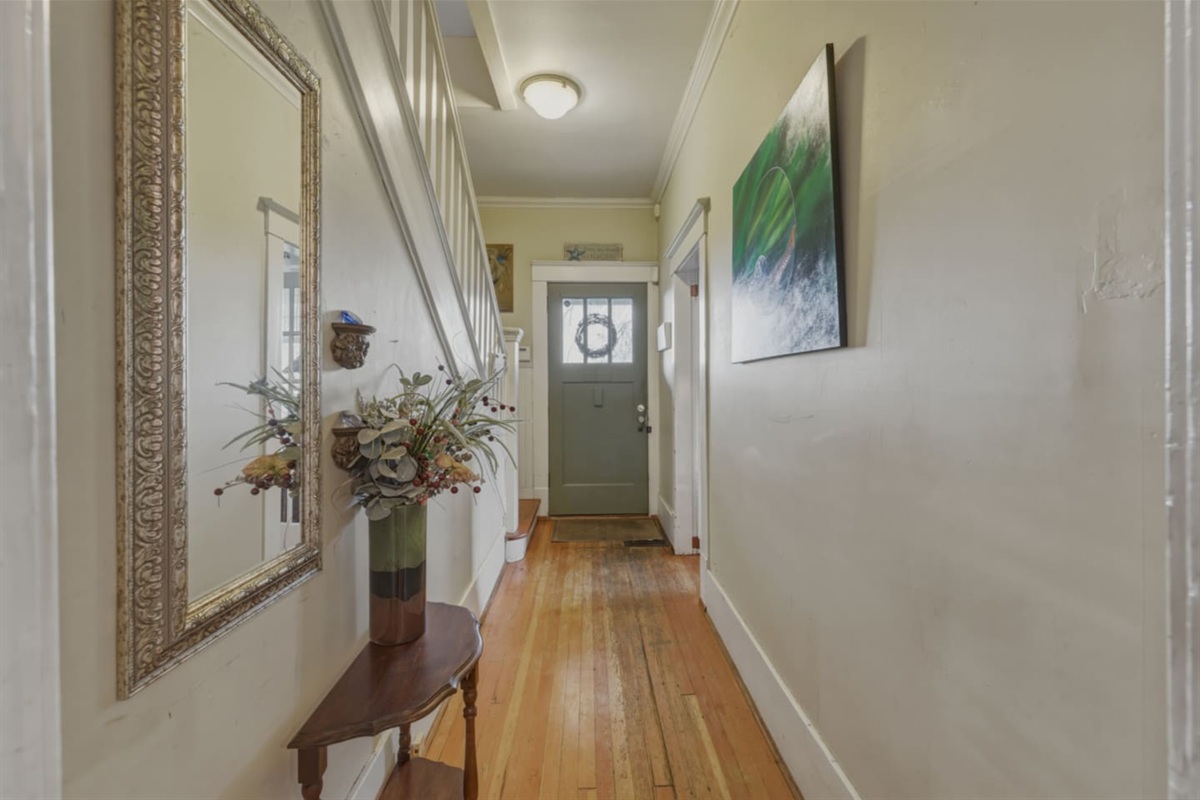 First floor hallway showing original wood fir flooring