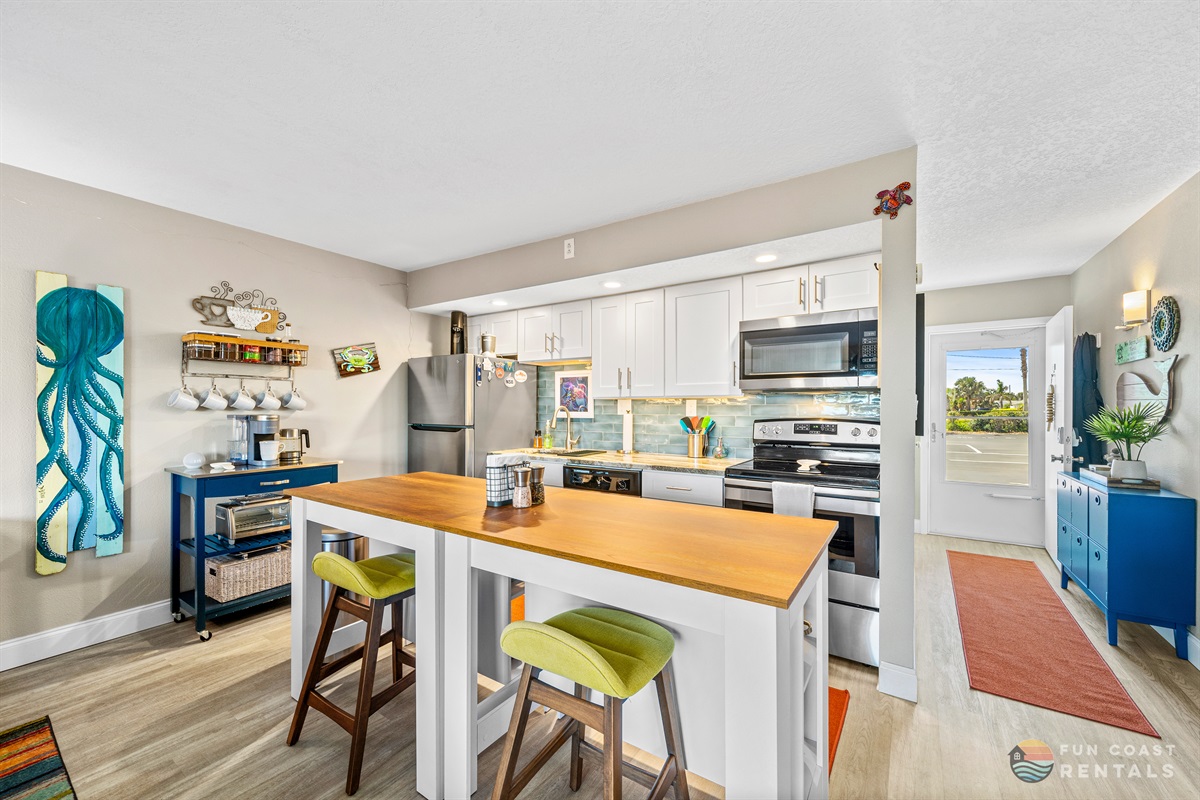 Dining Area and Stainless Steel Kitchen