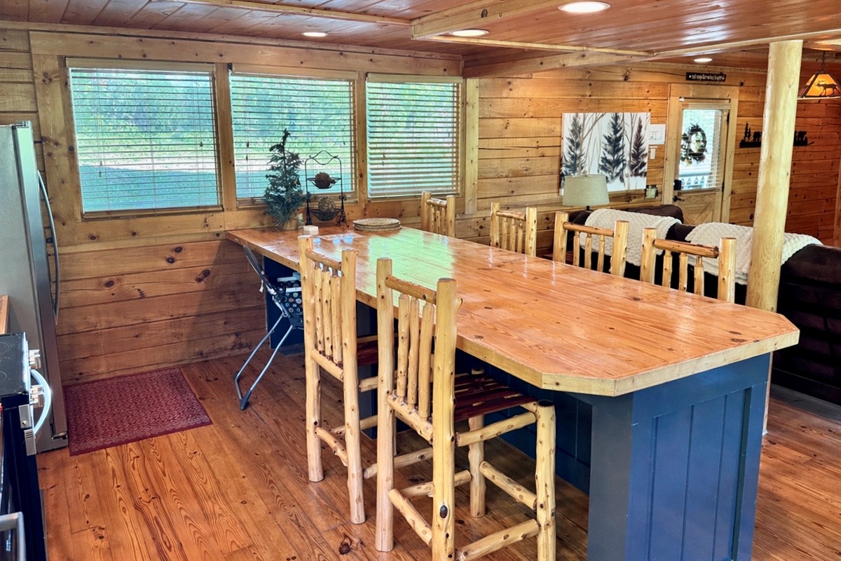 Seating for 6 at the bar and 10 more at the table.