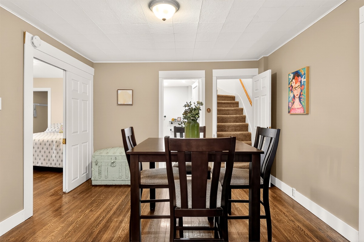 Additional seating or game table leading to the main floor full bathroom , Queen bedroom or upstairs - main floor