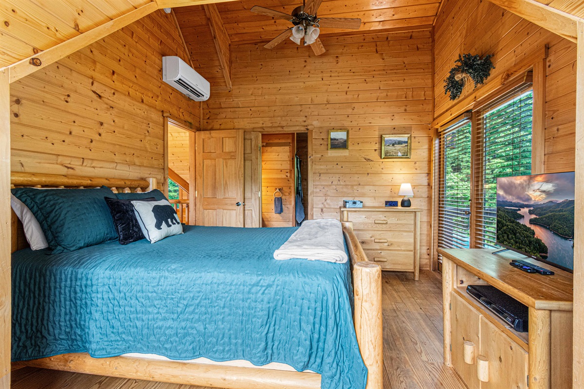 Upstairs Bedroom 2: Tranquil retreat with rustic charm, stunning views, and a plush king bed!
