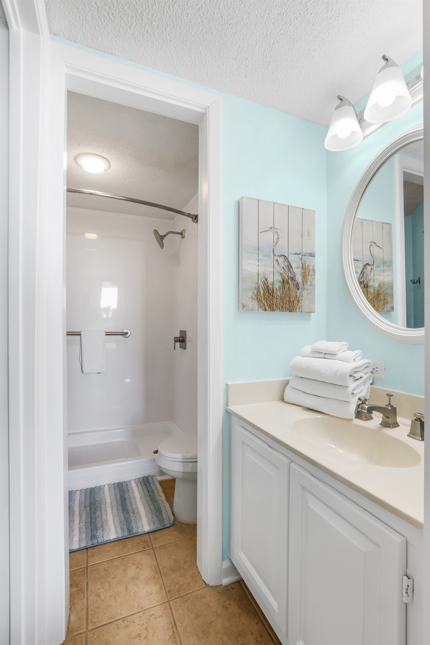 Ensuite in Primary. A clean, modern walk-in shower with integrated safety bars for peace of mind.