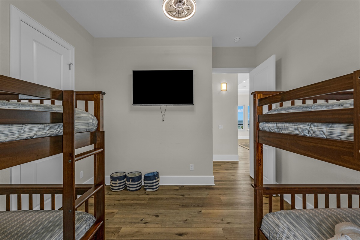 Costa Cristal Bedroom 4: A bright and welcoming bunk room designed for both comfort and convenience, offering a fun and cozy space perfect for kids or additional guests.