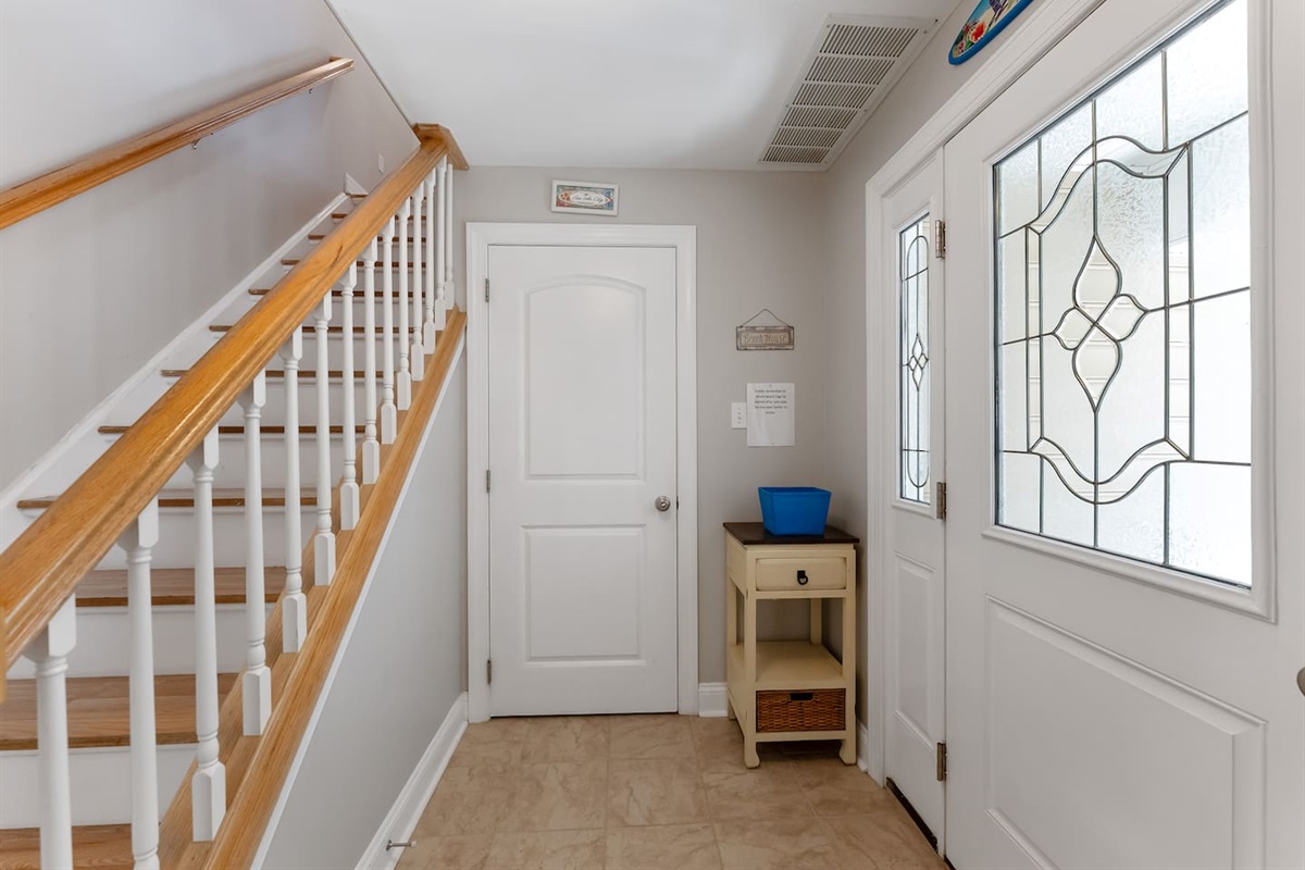 Bright, tiled entryway. 