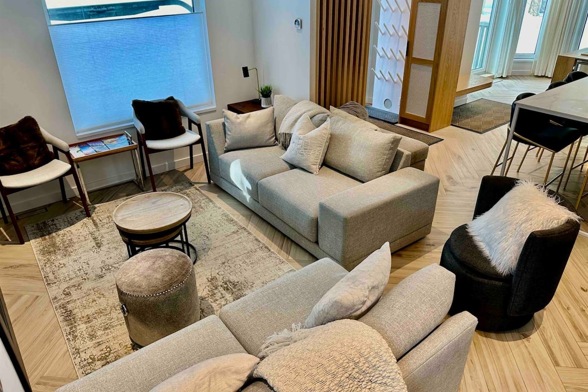 Best Whistler Rental - Main floor living room is all part of a stylishly designed open floor plan offering transitional utility for all aspects of your day and stay. 
