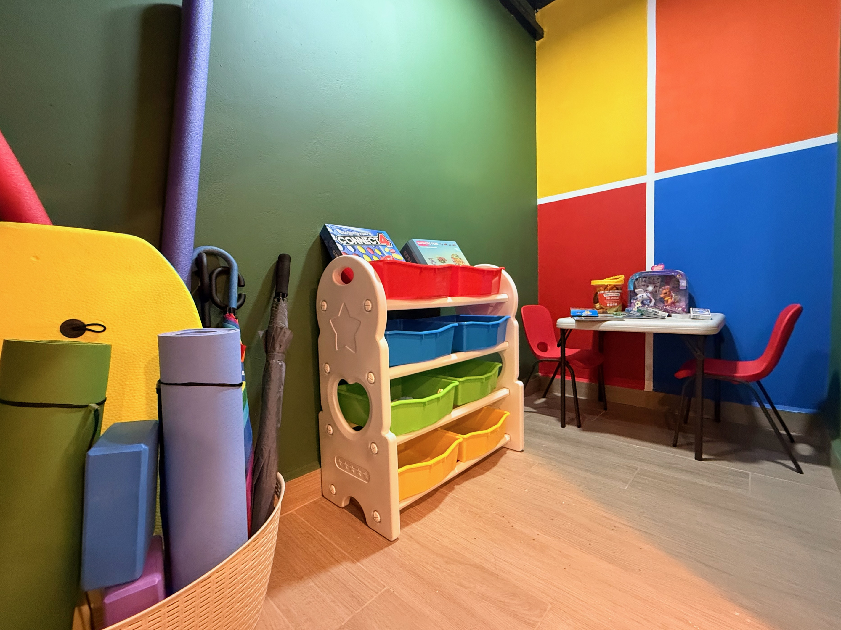 Kids areas in both houses. Toy storage, games, their own furniture.