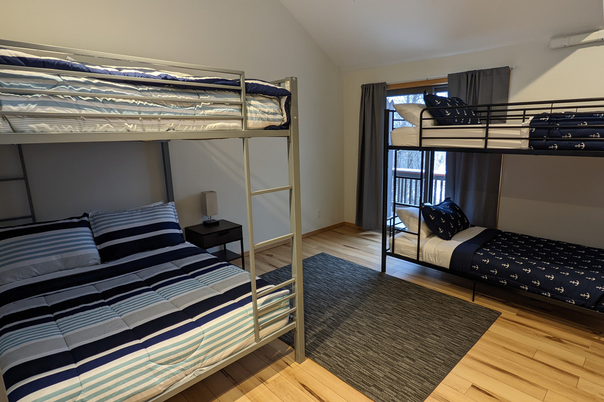 Large bedroom that sleeps 6 and has it own split AC unit