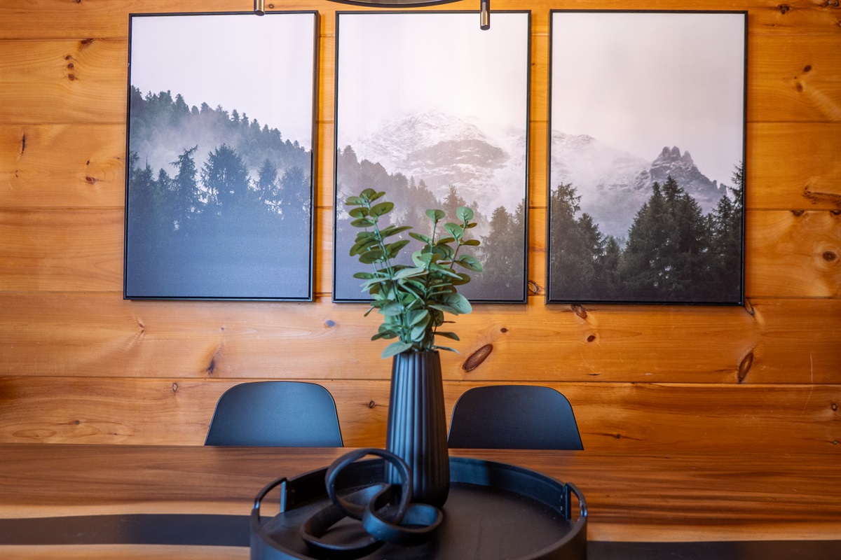 Thoughtful design and mountain-inspired art enhance the dining experience.