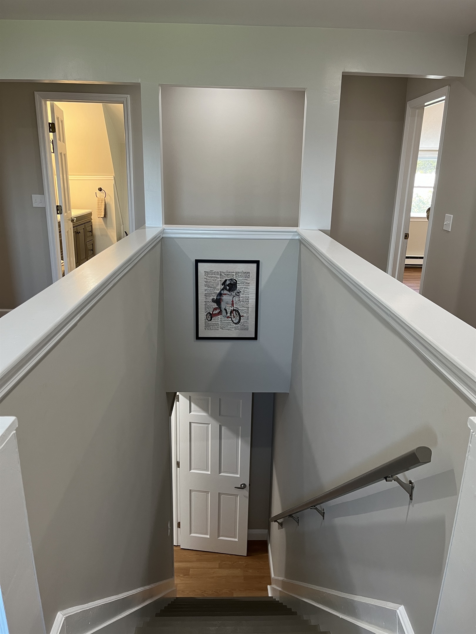 Hilltop Hideaway main stairwell leading to the 2nd floor.