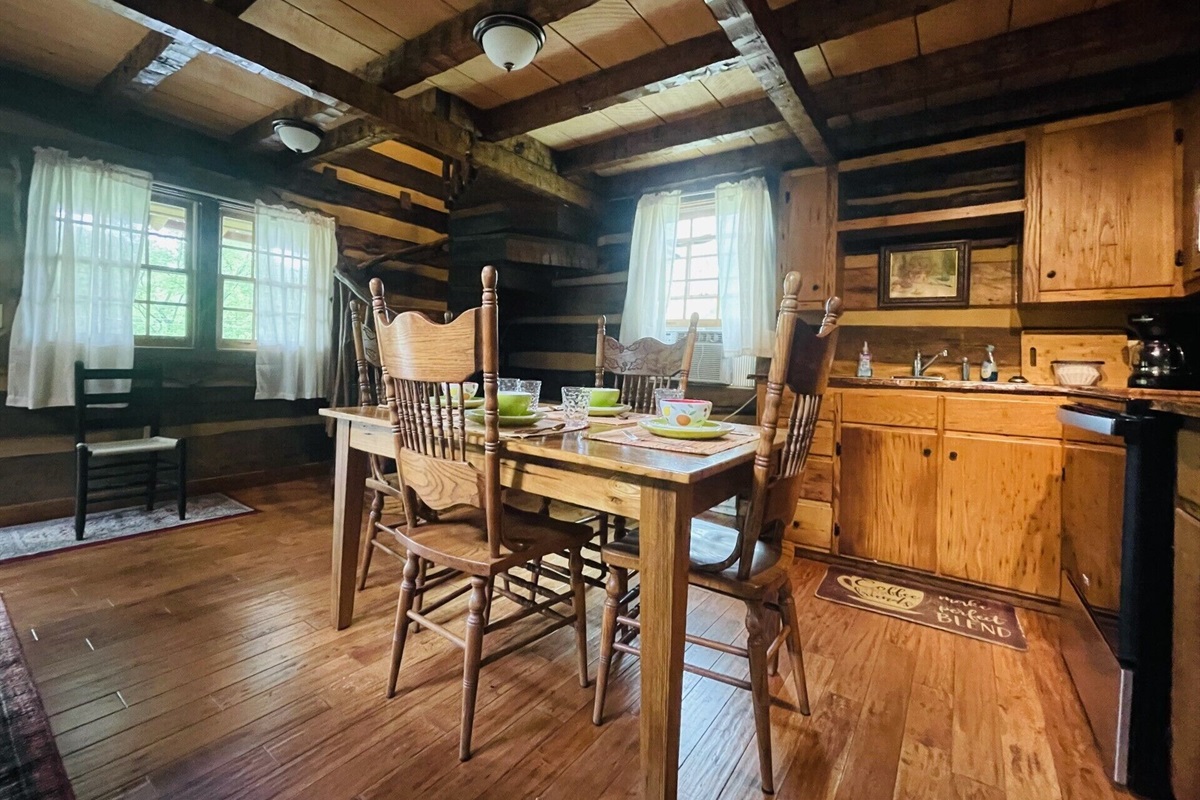 Kitchen and Dining. The kitchen is stocked for basic cooking and eating