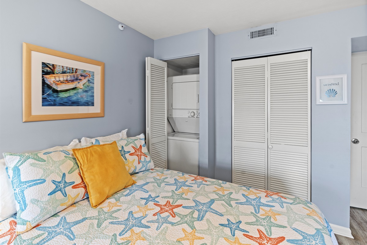 2 Double beds in the 2nd Bedroom with stackable washer and dryer