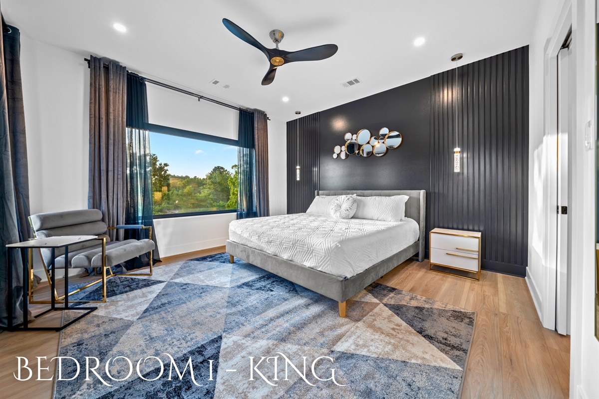 Wake up to a gorgeous view every morning in this serene and stylish bedroom. Sweet dreams guaranteed.