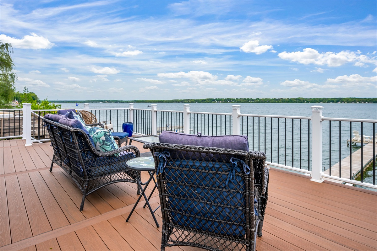 Enjoy morning coffee or sunset cocktails from the elevated deck with stunning lakefront views.