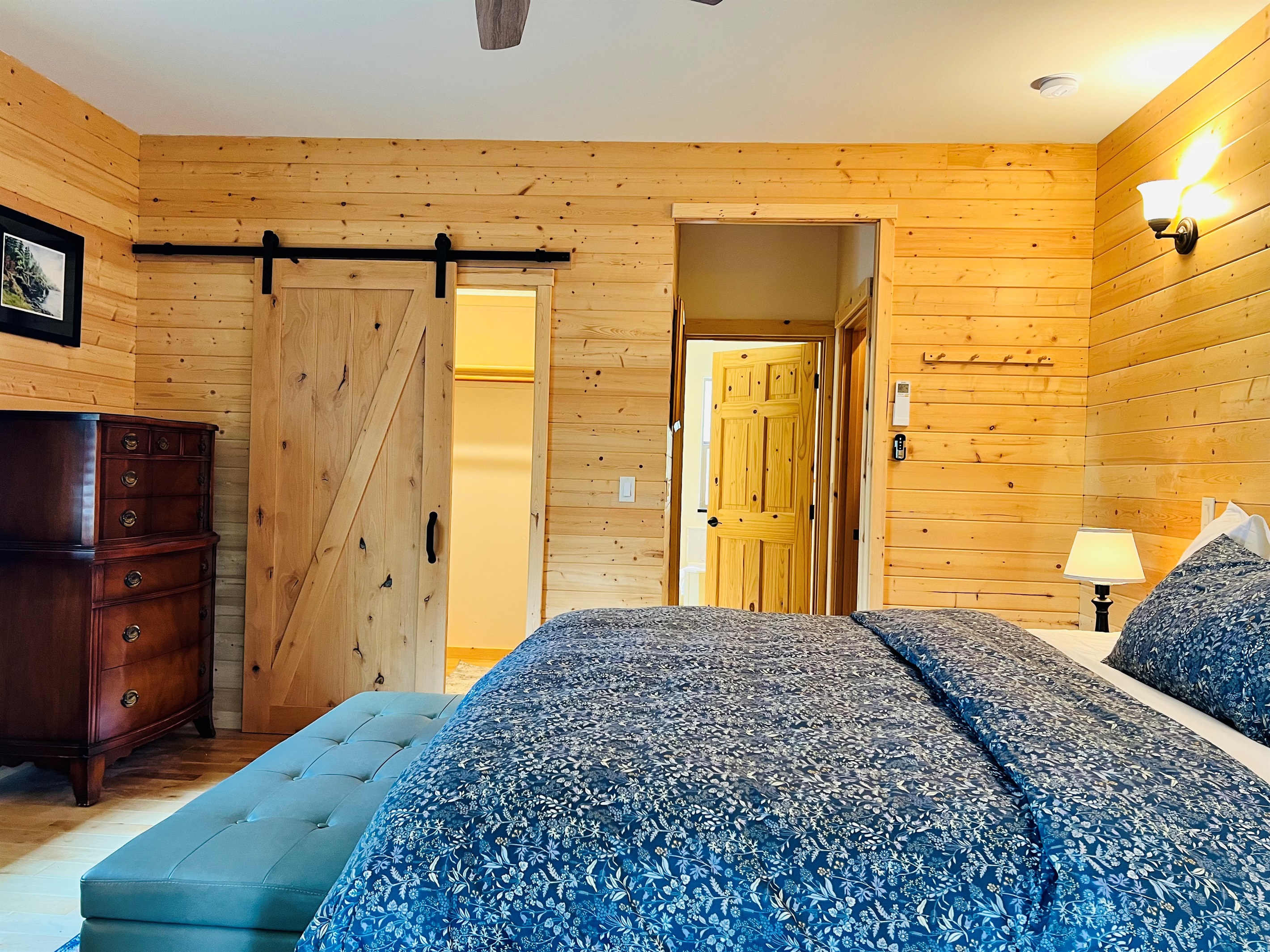 Primary bedroom on main level has it all.