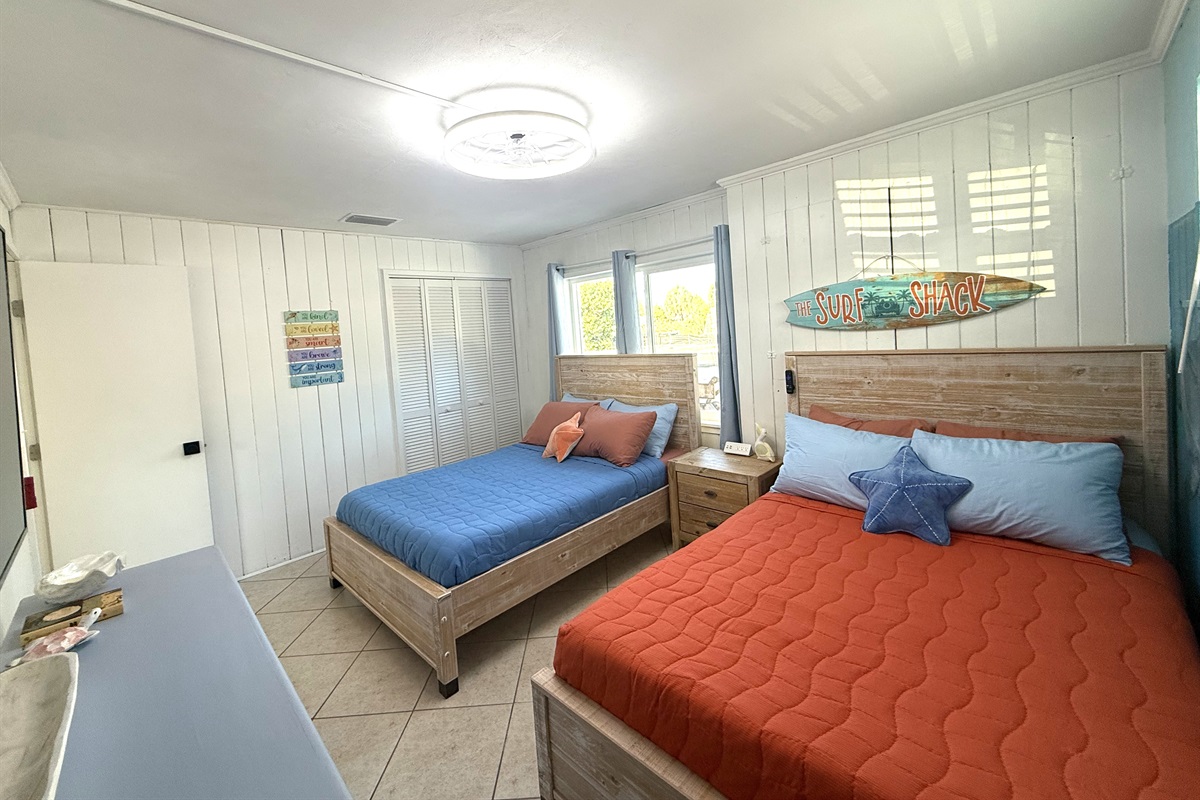 Bedroom #3 with Two Full Beds & 65" TV