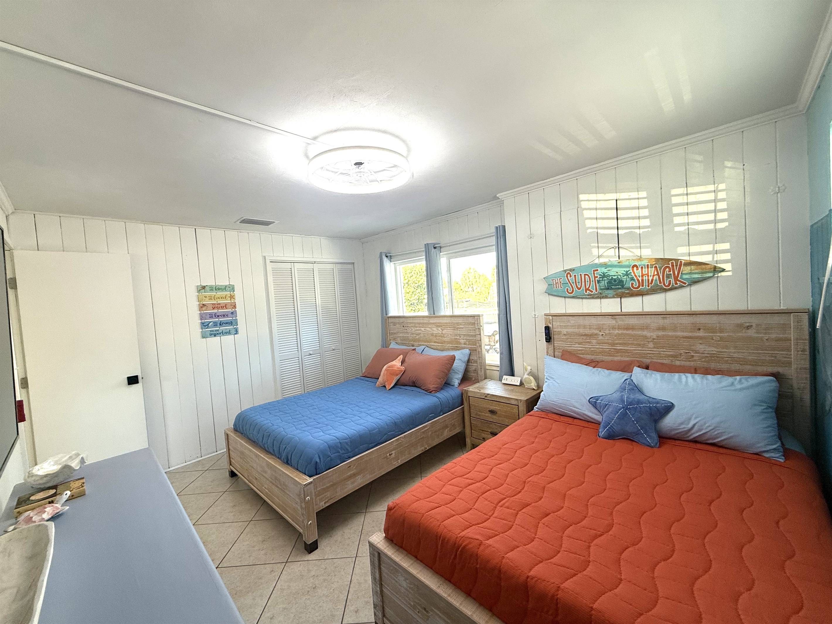 Bedroom #3 with Two Full Beds & 65" TV