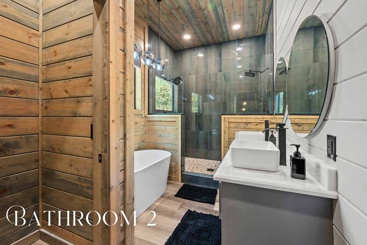 A deep soaking tub and walk-in shower give this bathroom the ultimate blend of rustic luxury and spa-day comfort.