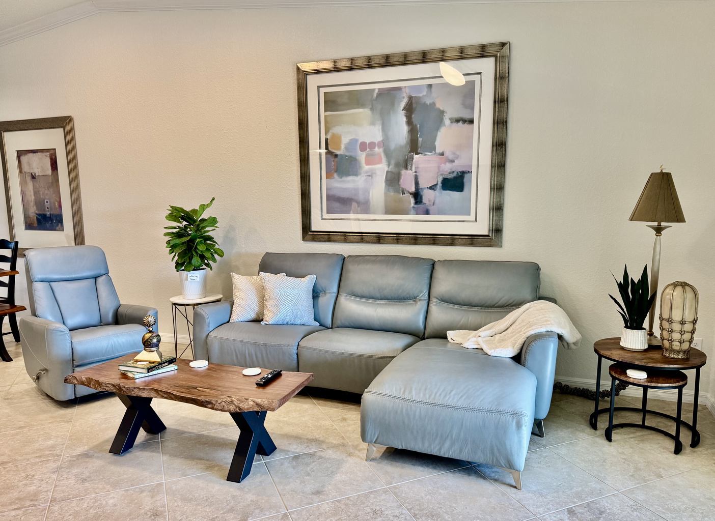 Fresh living room—new furniture, good light, stays clean.