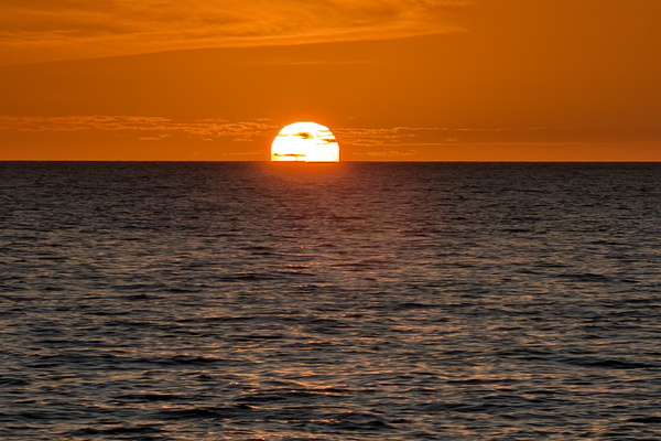 Golden hour along the Gulf shoreline, just a short walk from La Côte Naples.