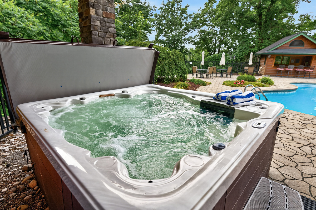 Hot tub beside the swimming pool