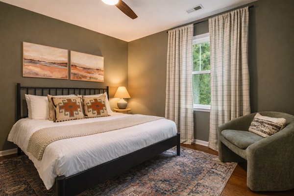 Simple, serene, and restful — a peaceful queen bedroom designed for a great night’s sleep.