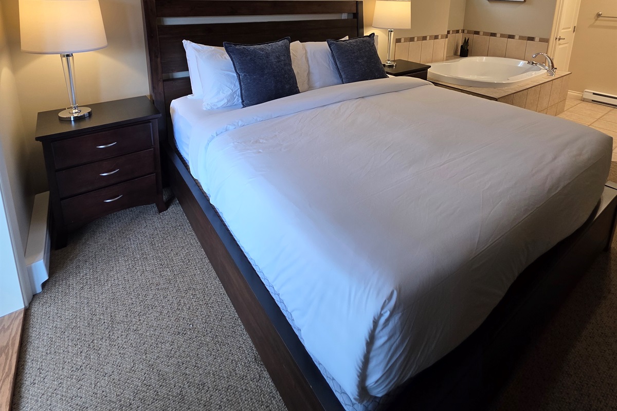 Unit A. King Bed. Soaker Tub right in room. Streaming TV in room as well.