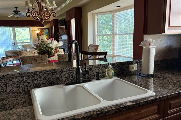 You can still be part of the conversation while preparing delicious meals in our open floor plan.