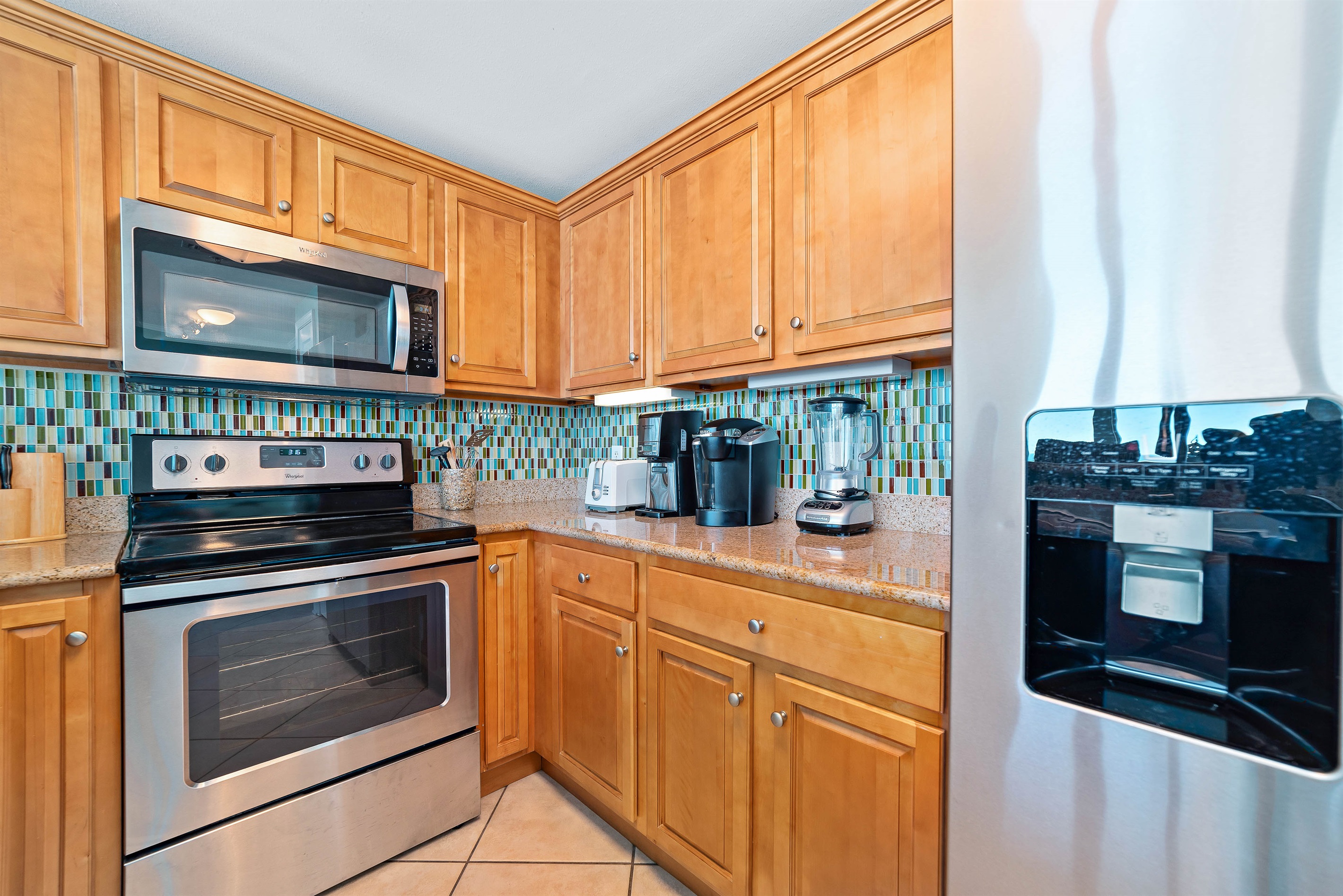 Bright and airy kitchen with ample counter space and modern amenities, creating an inviting space for cooking and gathering.