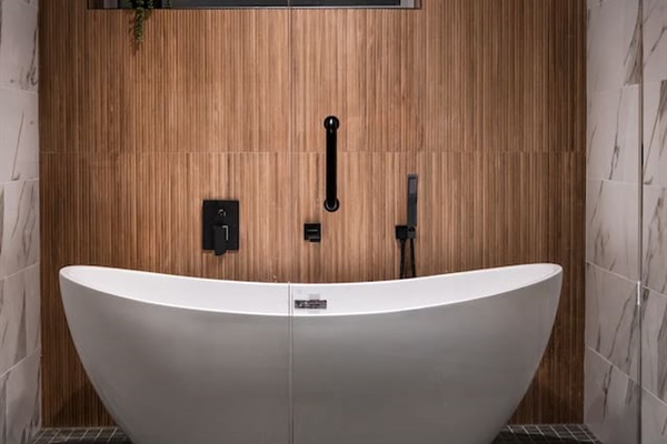 Basement soaker tub and shower room double sink