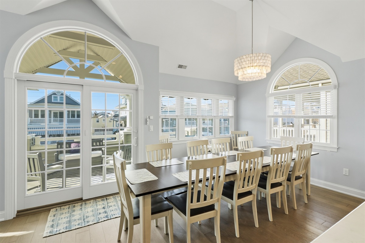 Spacious dining area with a large table and seating for 10
