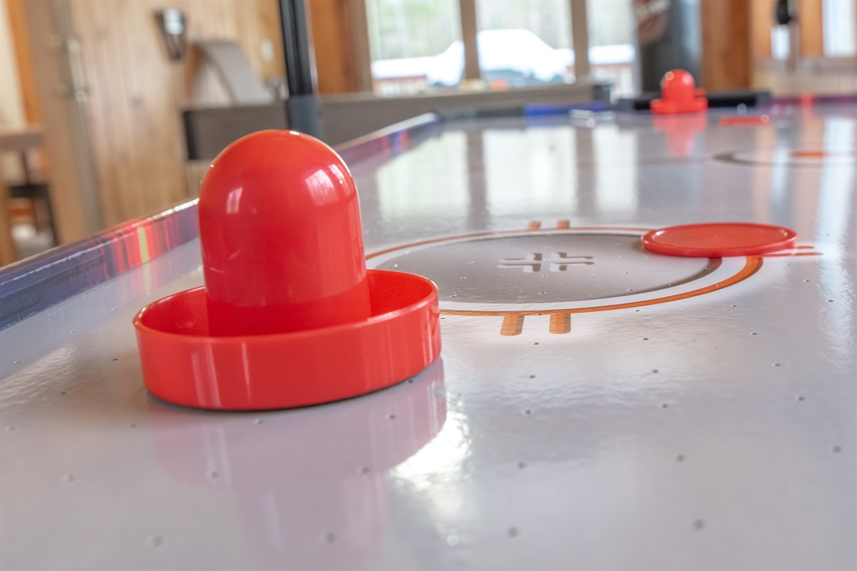 Enjoy a game of Air Hockey in our Game Room!