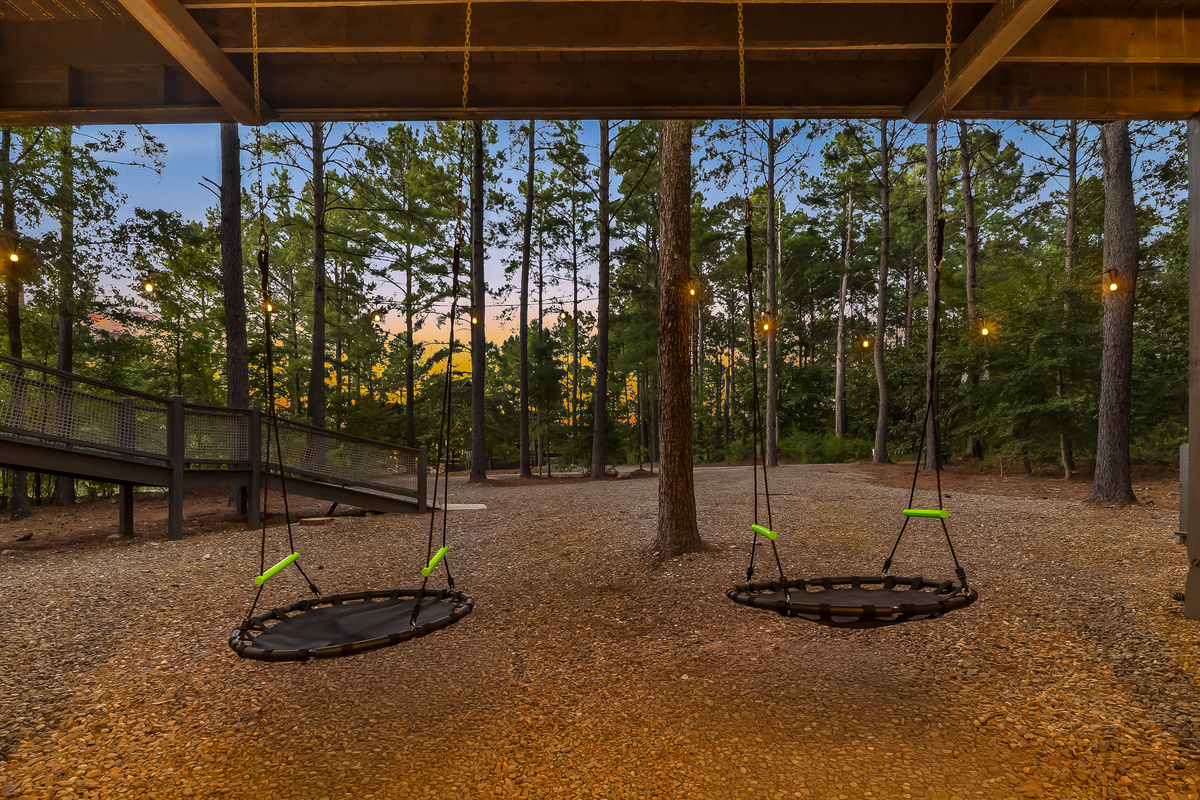 There’s room to swing, explore and burn off some energy — all tucked safely beneath the treehouse.