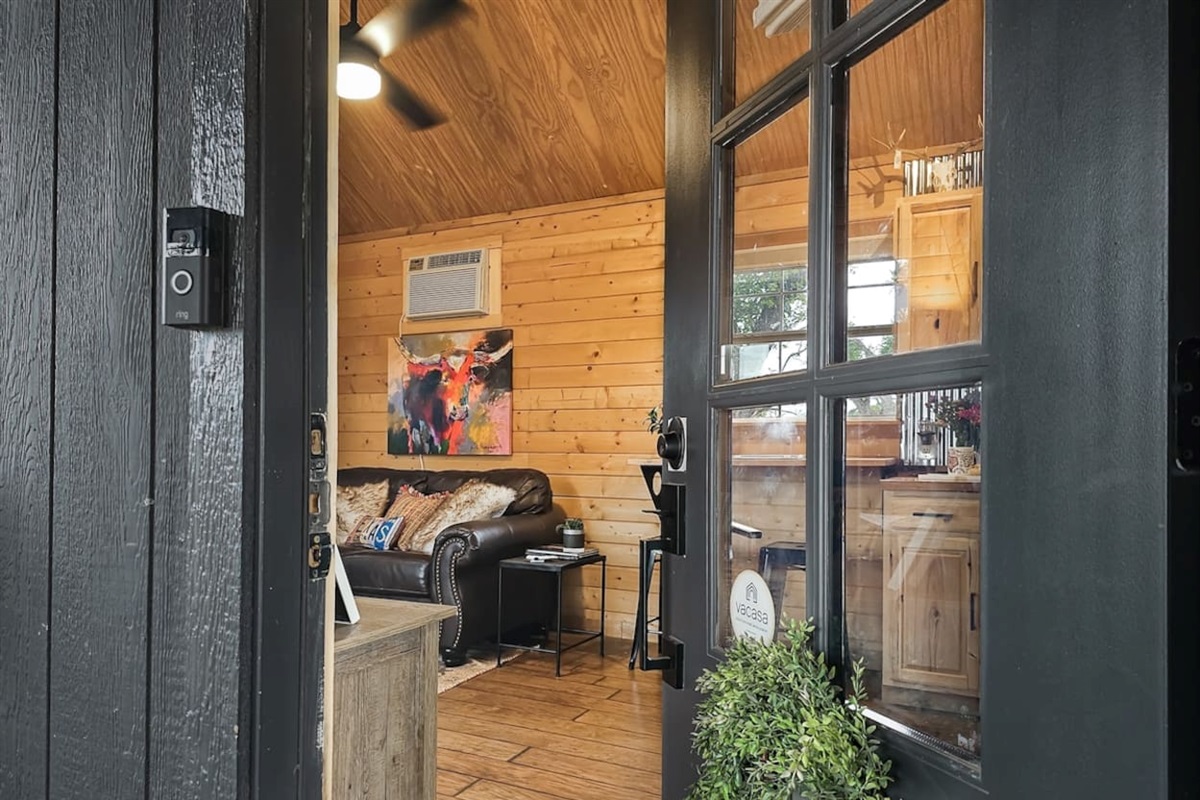 Step on in, y’all! This cozy cabin welcomes you with open arms and a warm Texas vibe.
