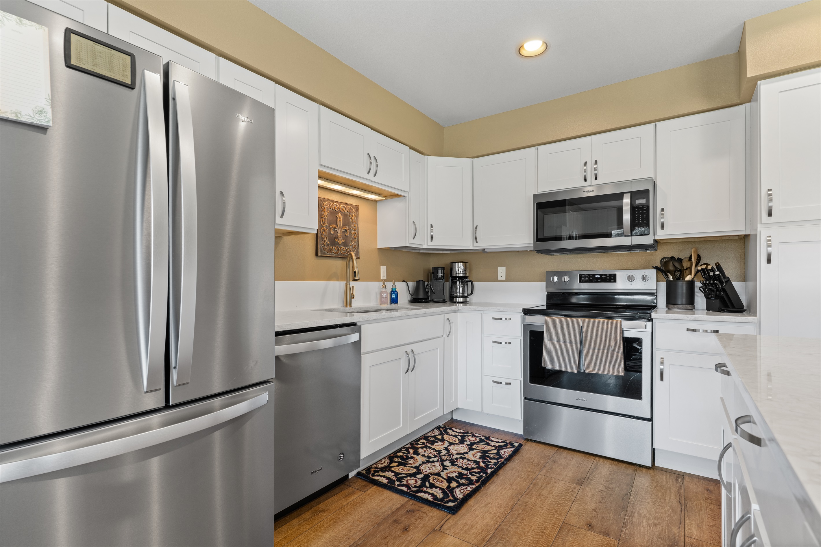 Kitchen with new stainless steel appliances