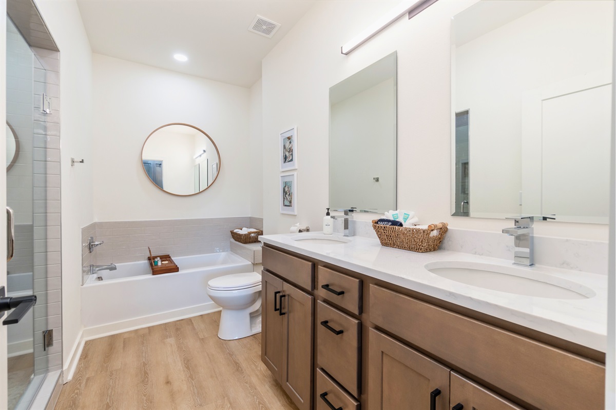 En-Suite Primary Bathroom with Double Sinks and Separate Tub/Shower