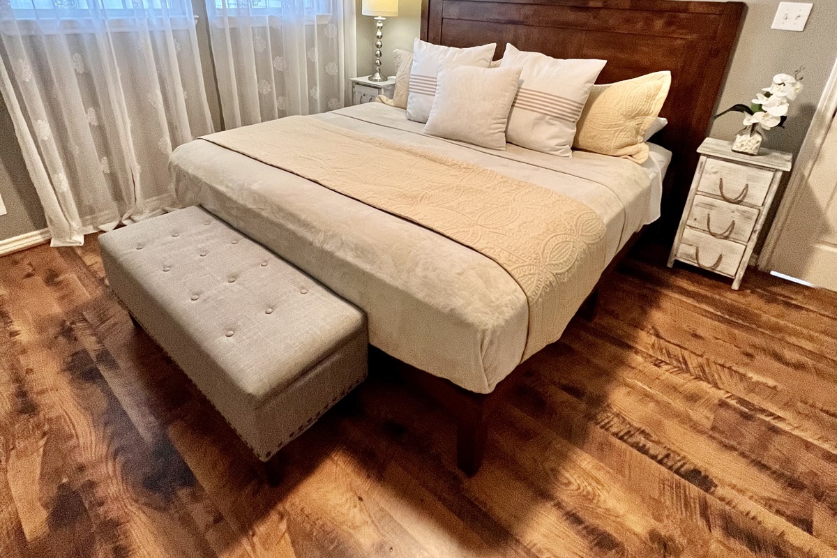 Primary bedroom with smart Tv and King size bed