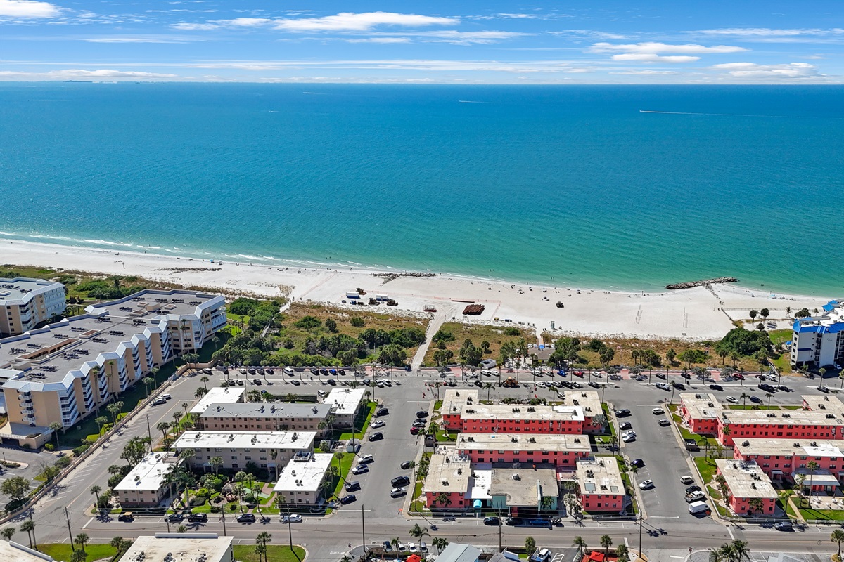The Friendly Native is left of the coral building. .  St. Pete Beach is just steps away!