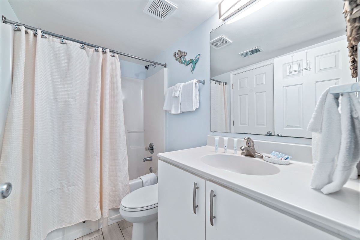 Primary Bath - Freshly updated bathroom featuring a shower/tub combination, ample vanity space, and modern fixtures.